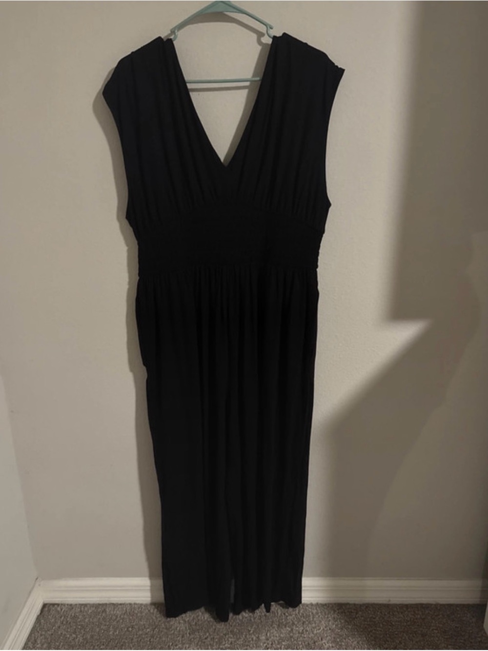 Black V-Neck Jumpsuit- Classic Sleeveless Style